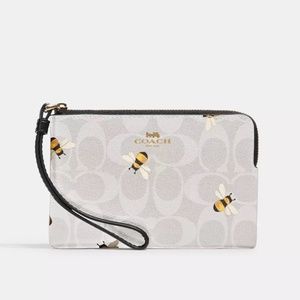 Coach Corner Zip Wristlet In Signature Canvas With Bee Print